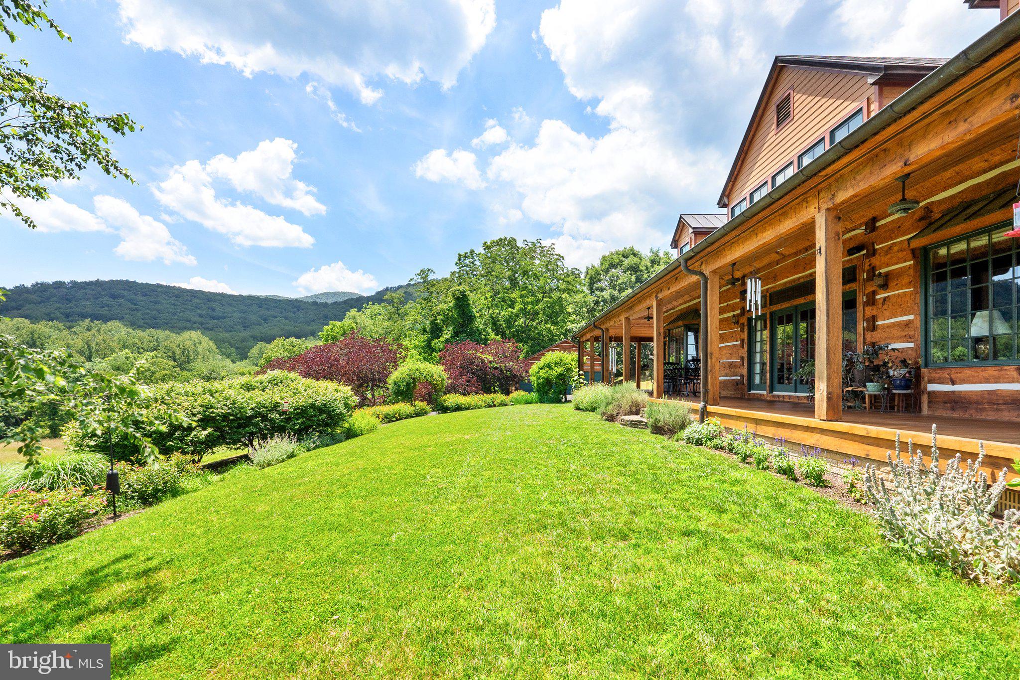 156 Bear Wallow Road Huntly, VA 22640 - Photo 8 of 68 a front view of a house with a yard