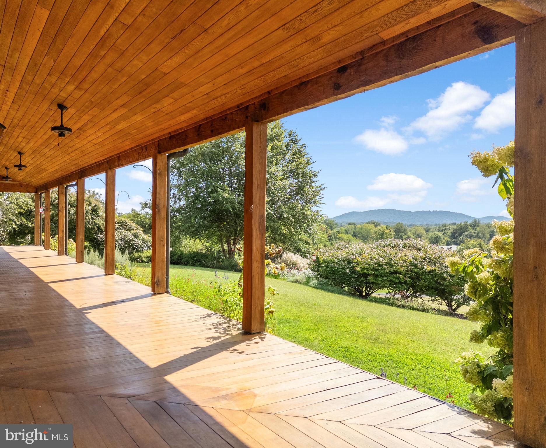 156 Bear Wallow Road Huntly, VA 22640 - Photo 9 of 68 a view of porch with a garden