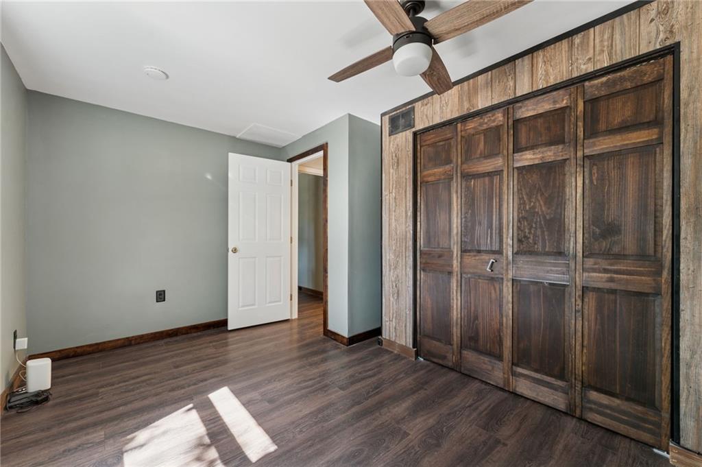 611 Alexander Avenue Monaca, PA 15061 - Photo 18 of 34 a view of an empty room with wooden floor