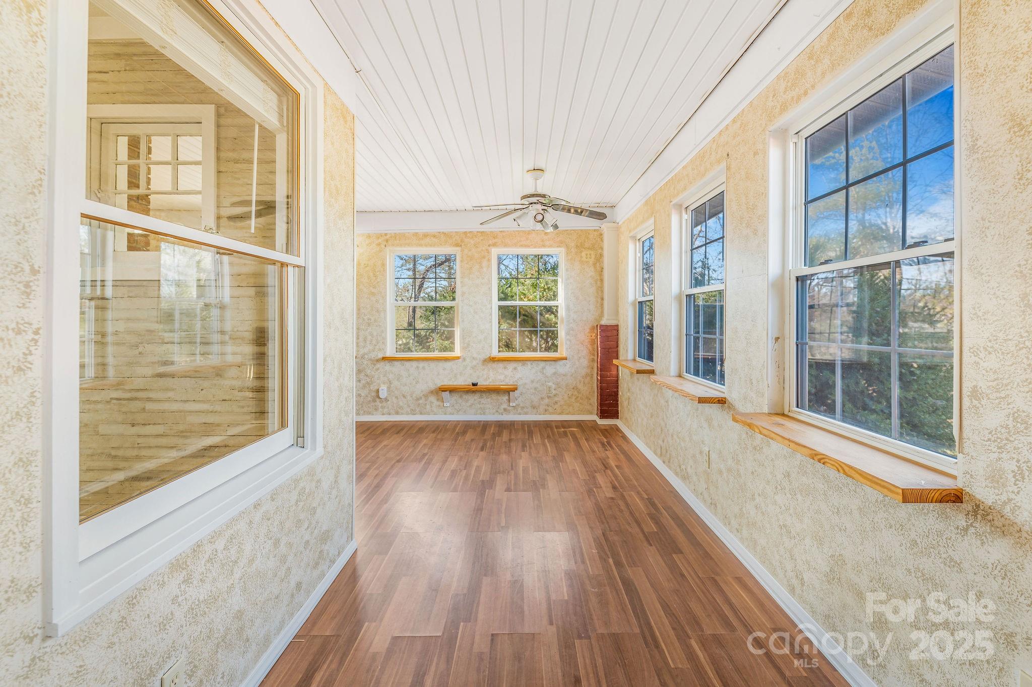 107 Woodland Church Road Clyde, NC 28721 - Photo 25 of 42 a view of outdoor space with wooden floor and windows