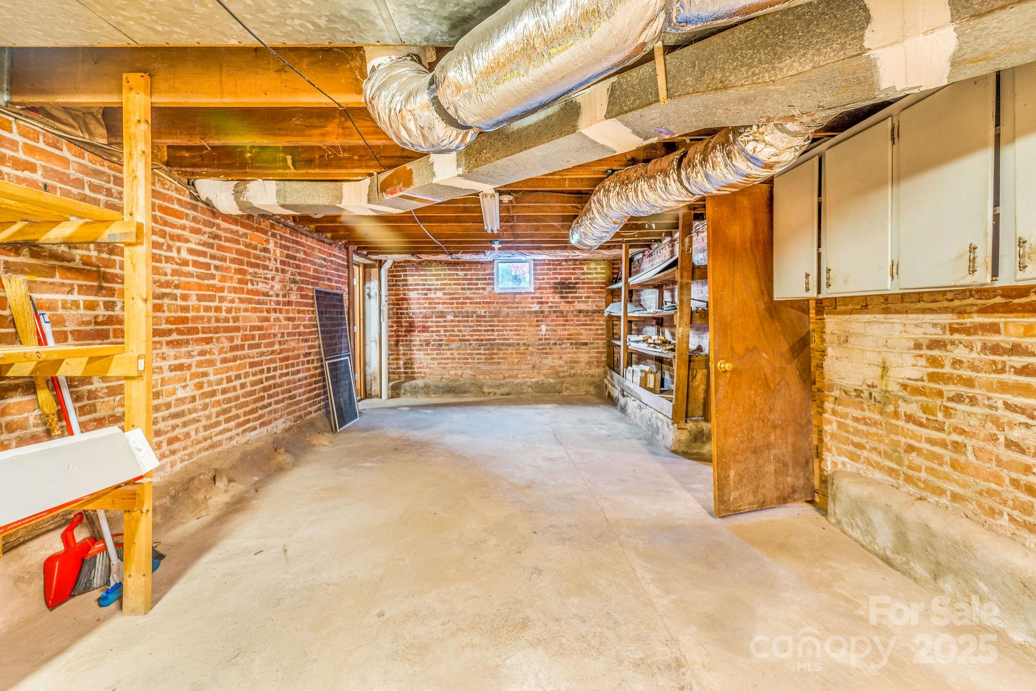 107 Woodland Church Road Clyde, NC 28721 - Photo 26 of 42 a view of a room with wooden walls
