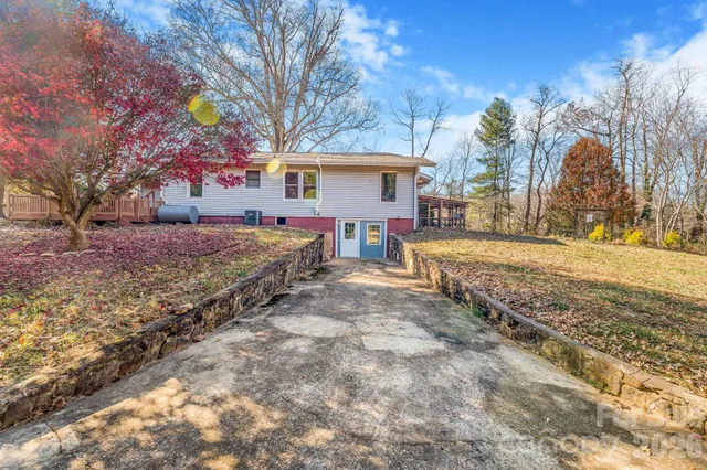 a view of a yard covered with snow in the background