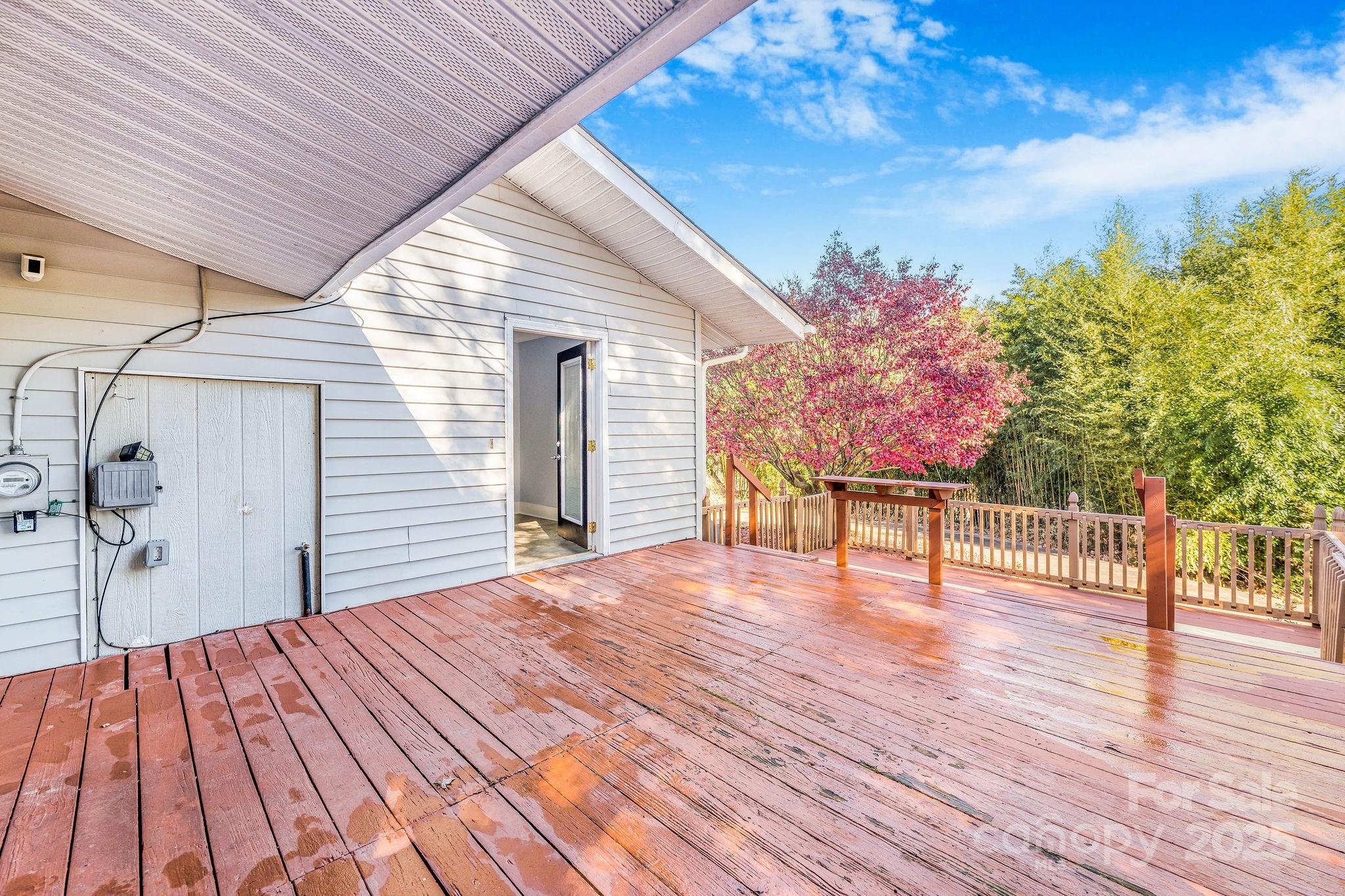 107 Woodland Church Road Clyde, NC 28721 - Photo 29 of 42 a bedroom with a bed and a table