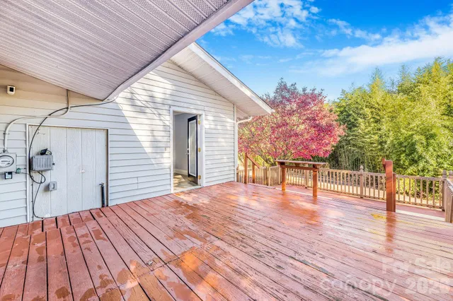 a bedroom with a bed and a table