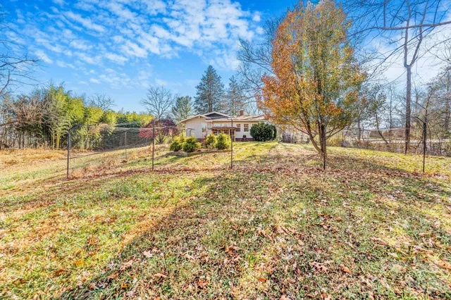 a view of yard and covered with snow
