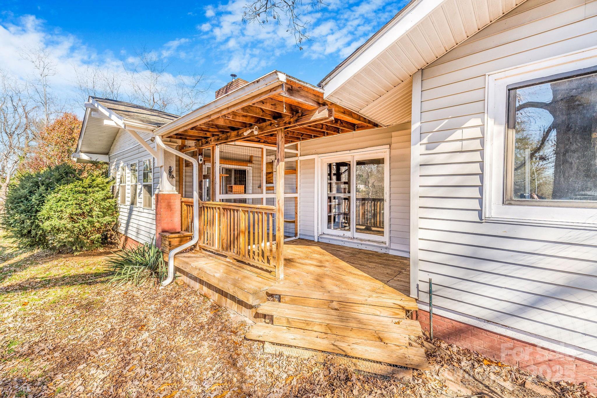 107 Woodland Church Road Clyde, NC 28721 - Photo 38 of 42 a view of a house with a large window