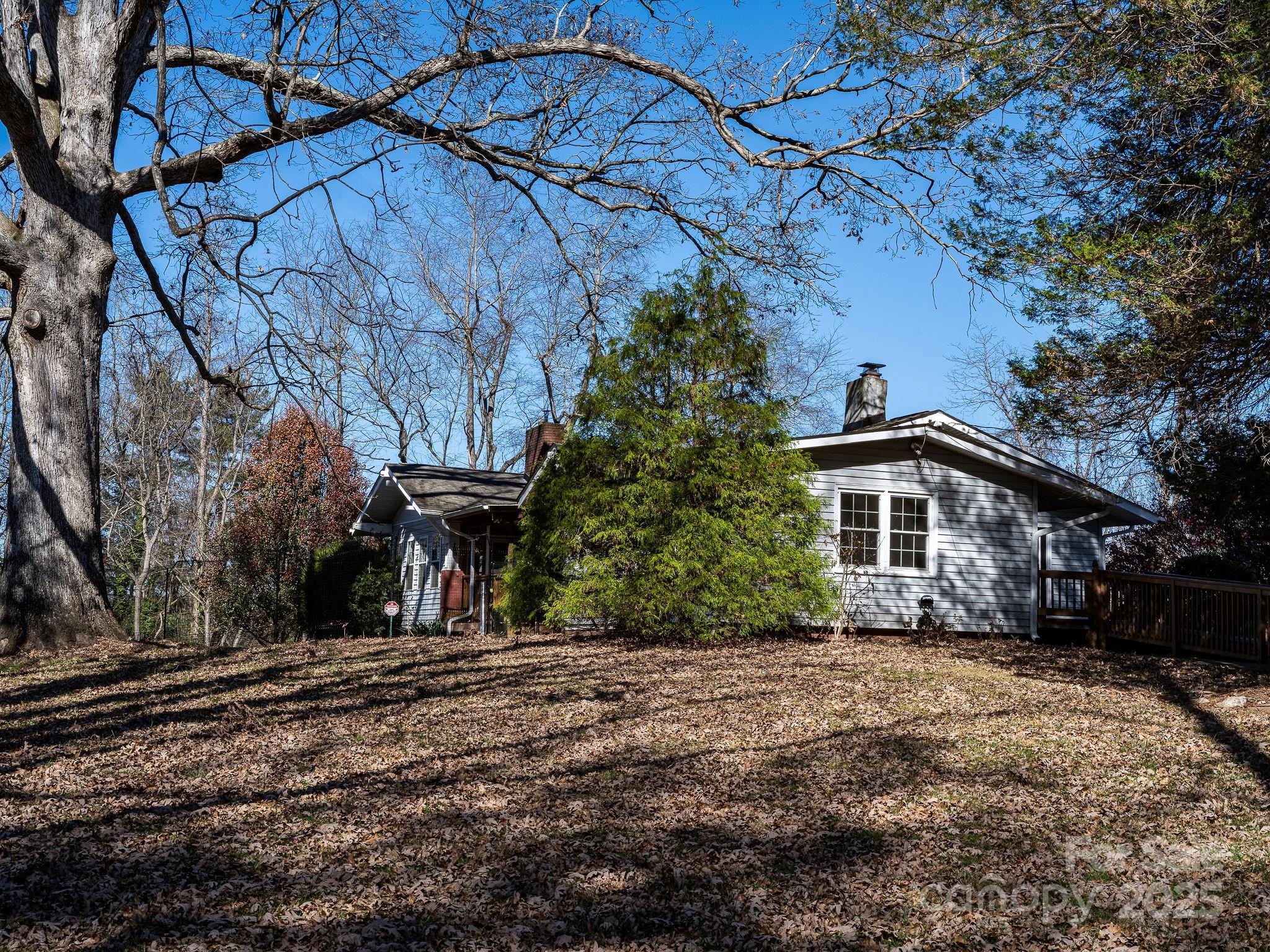 107 Woodland Church Road Clyde, NC 28721 - Photo 41 of 42 a front view of a house with a yard