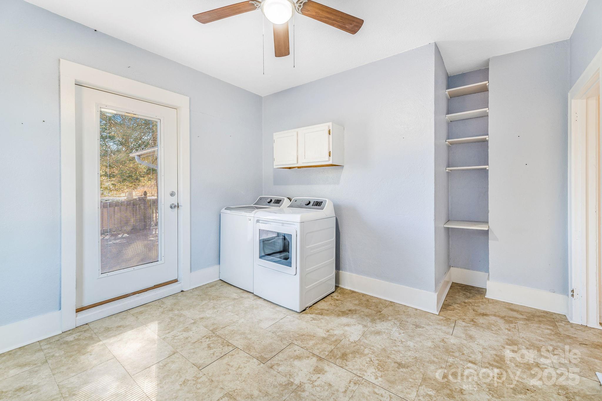 107 Woodland Church Road Clyde, NC 28721 - Photo 5 of 42 a view of utility room with washer and dryer