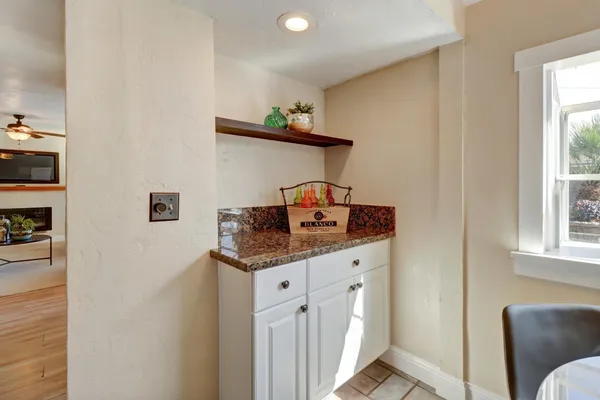 a hallway with washer and dryer