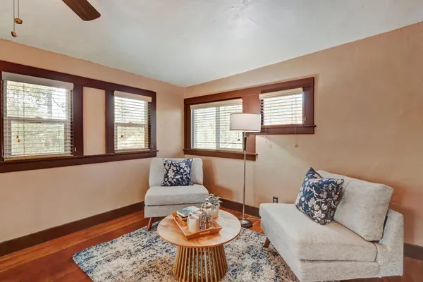 a living room with furniture and a window