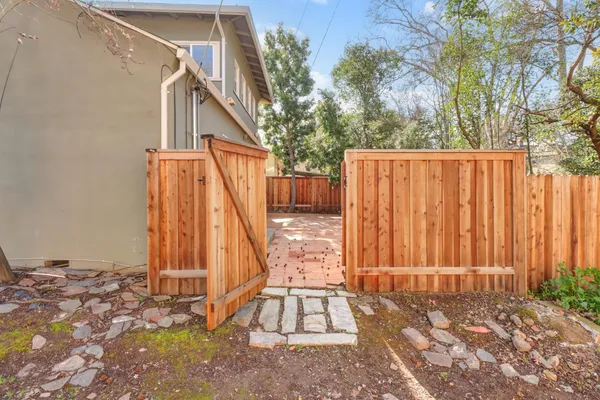 a view of backyard with deck