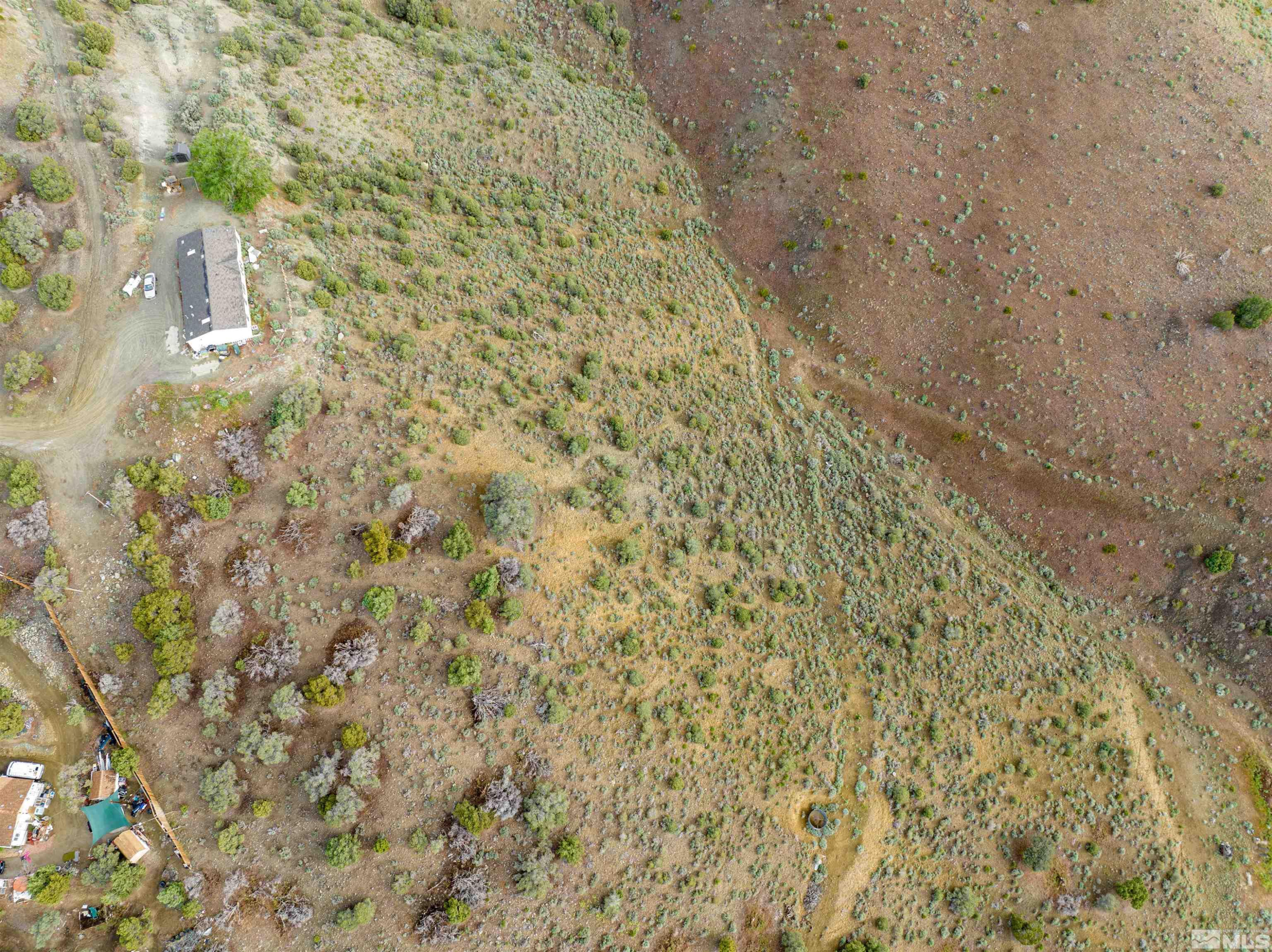 266 Linehan Road Carson City, NV 89706 - Photo 6 of 9 a bathroom with a shower curtain