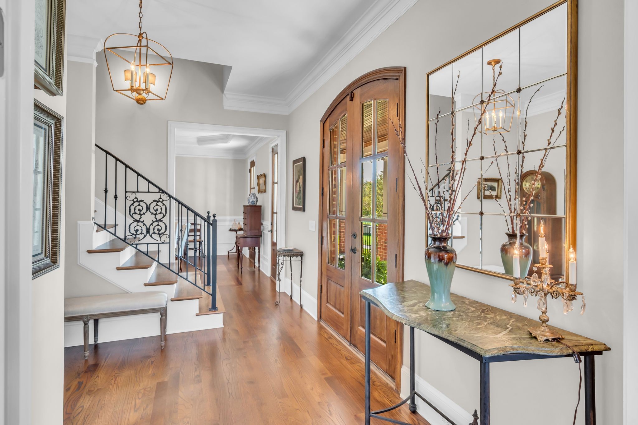 2449 Durham Manor Drive Franklin, TN 37064 - Photo 14 of 88 a view of entryway dining room and hall with wooden floor