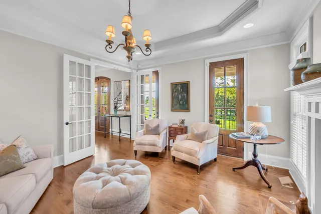 a living room with furniture and a rug