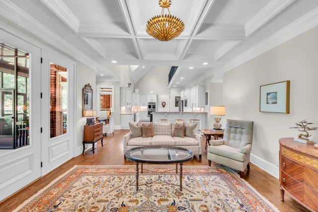 a kitchen with stainless steel appliances granite countertop lots of counter top space and furniture