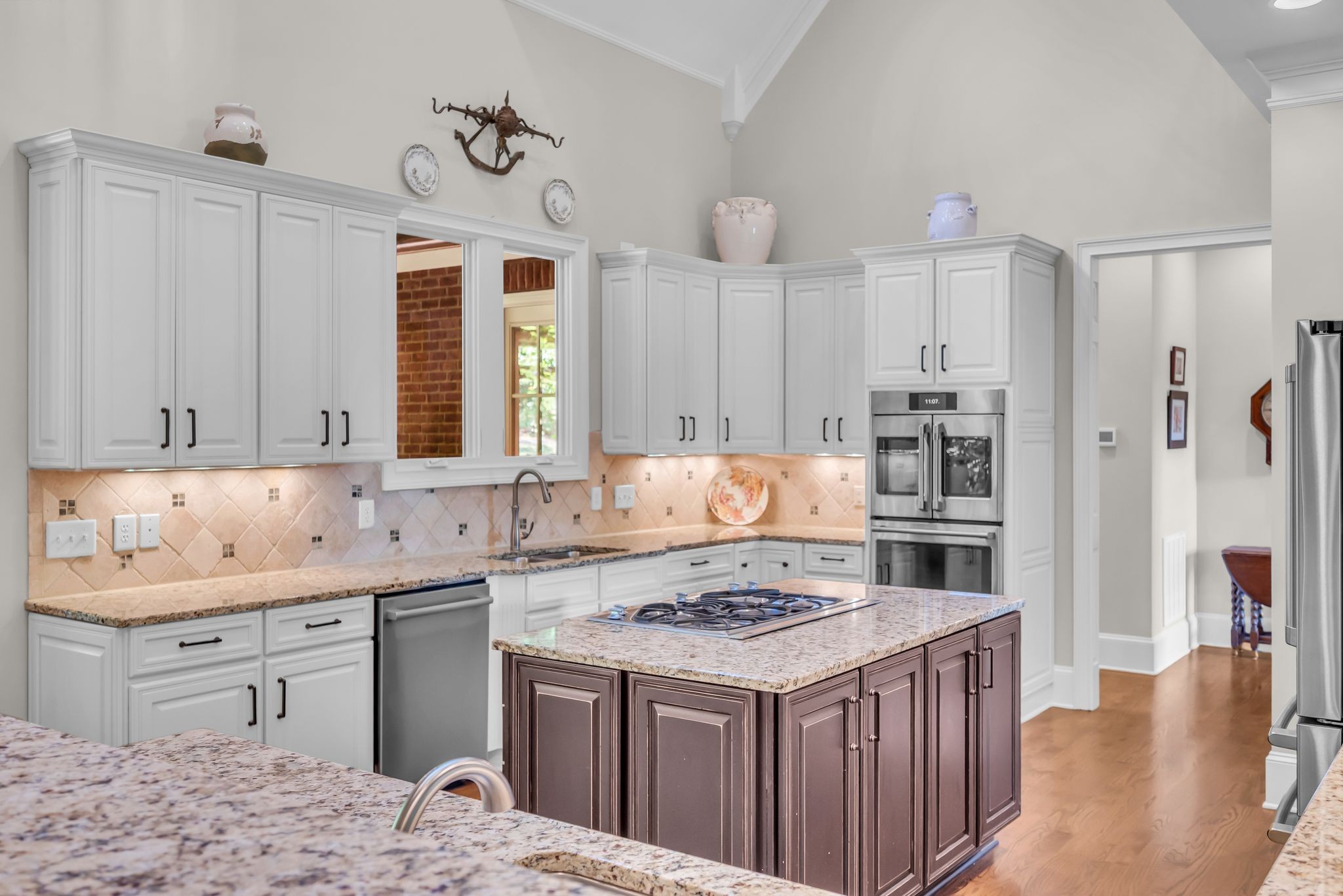 2449 Durham Manor Drive Franklin, TN 37064 - Photo 25 of 88 a kitchen with a sink stove and refrigerator
