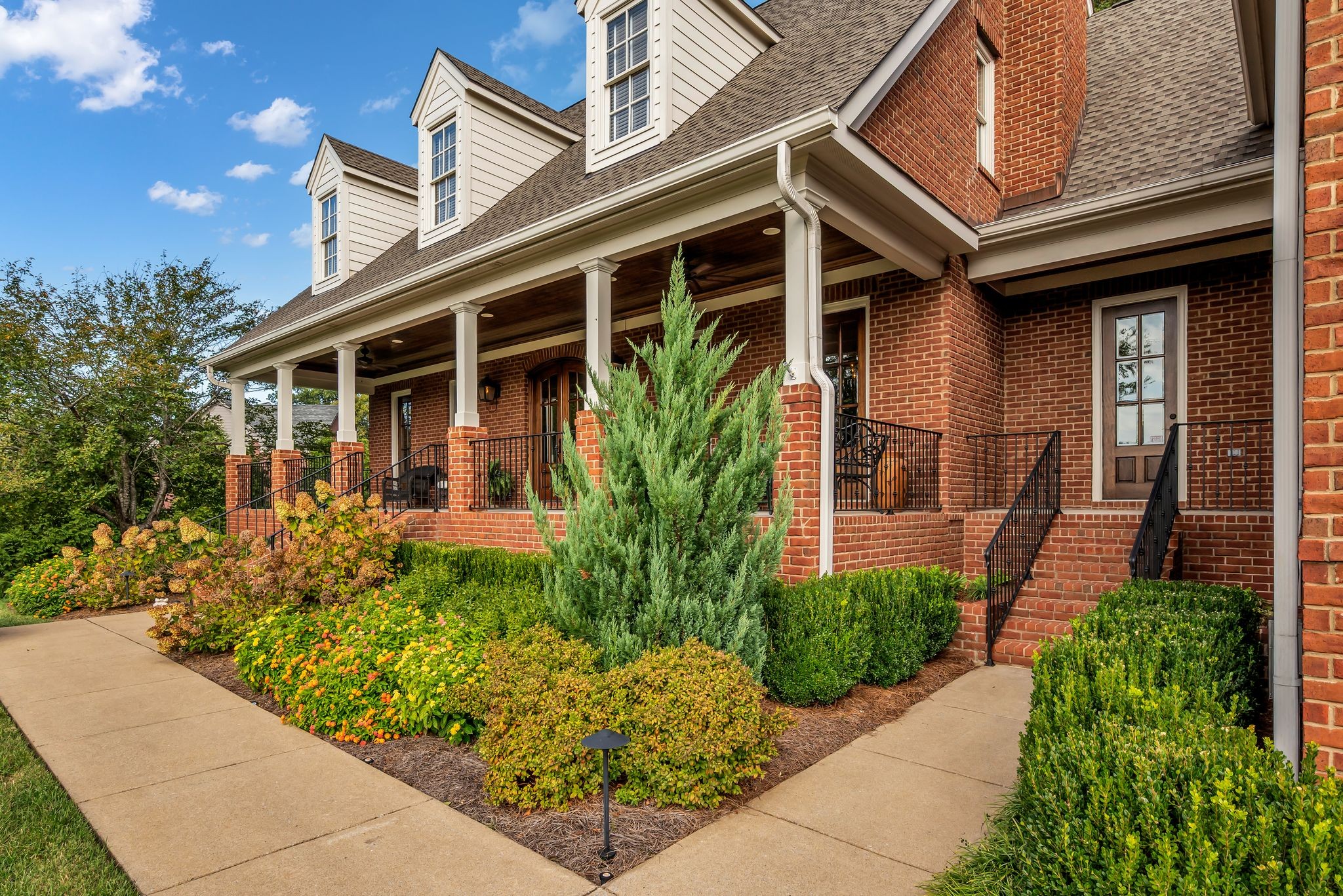 2449 Durham Manor Drive Franklin, TN 37064 - Photo 3 of 88 a front view of a house with a yard
