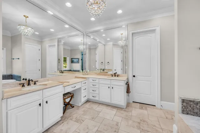 a bedroom with furniture and a book shelf