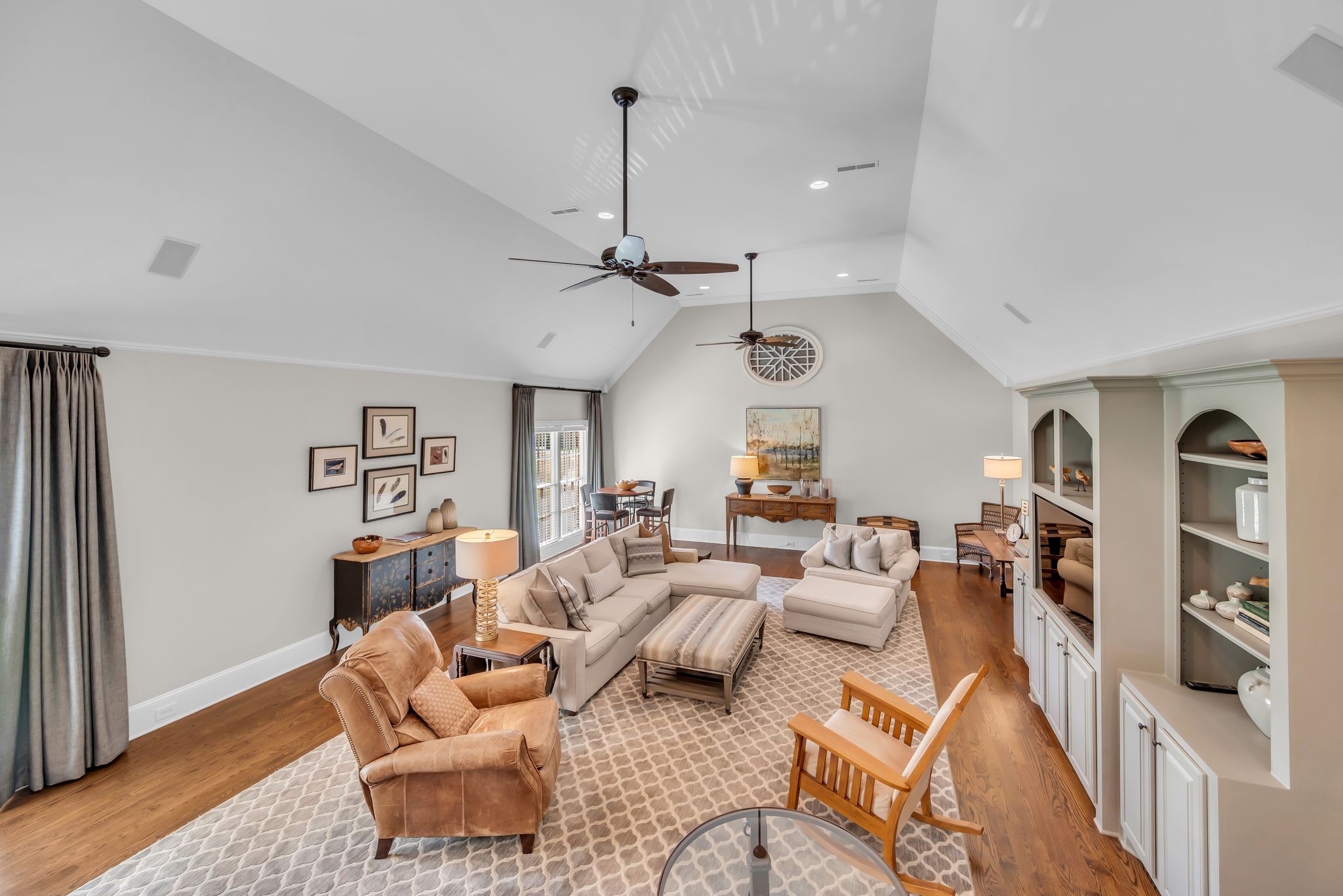 2449 Durham Manor Drive Franklin, TN 37064 - Photo 38 of 88 a living room with furniture a flat screen tv and a window