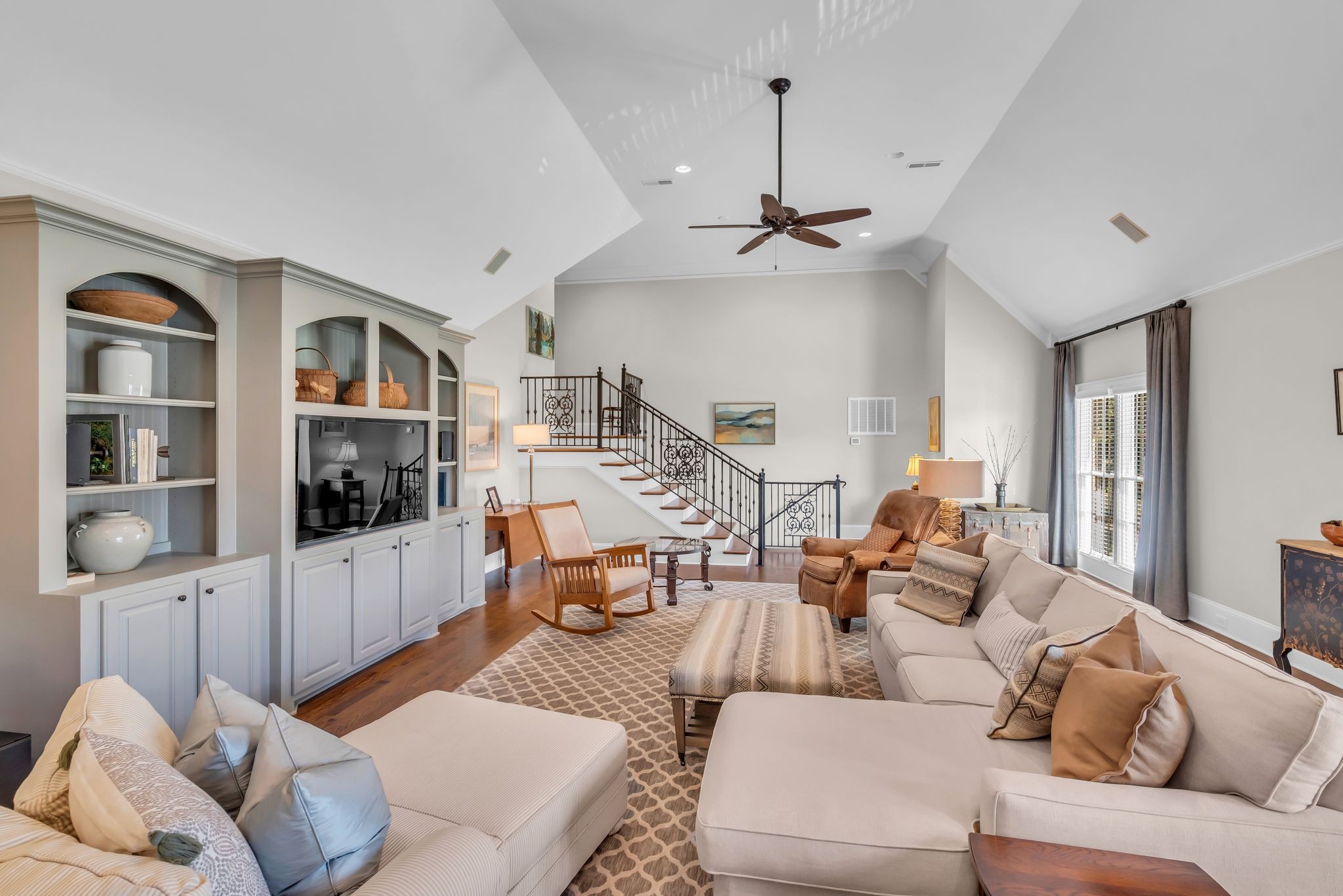 2449 Durham Manor Drive Franklin, TN 37064 - Photo 40 of 88 a living room with furniture a flat screen tv and a window