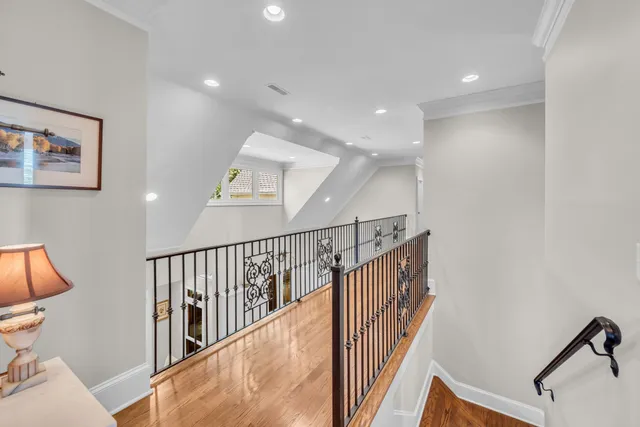 a view of a park with a house in the background