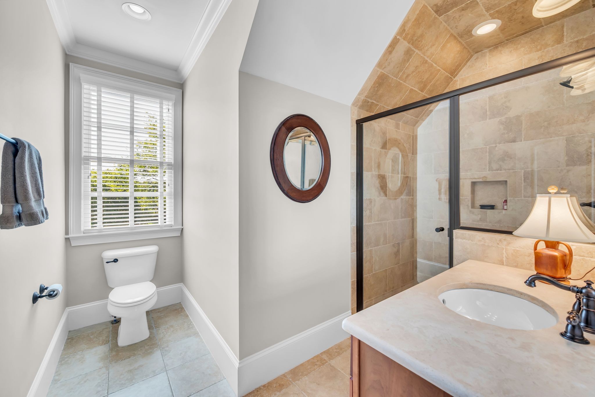 2449 Durham Manor Drive Franklin, TN 37064 - Photo 46 of 88 a bathroom with a toilet sink and mirror