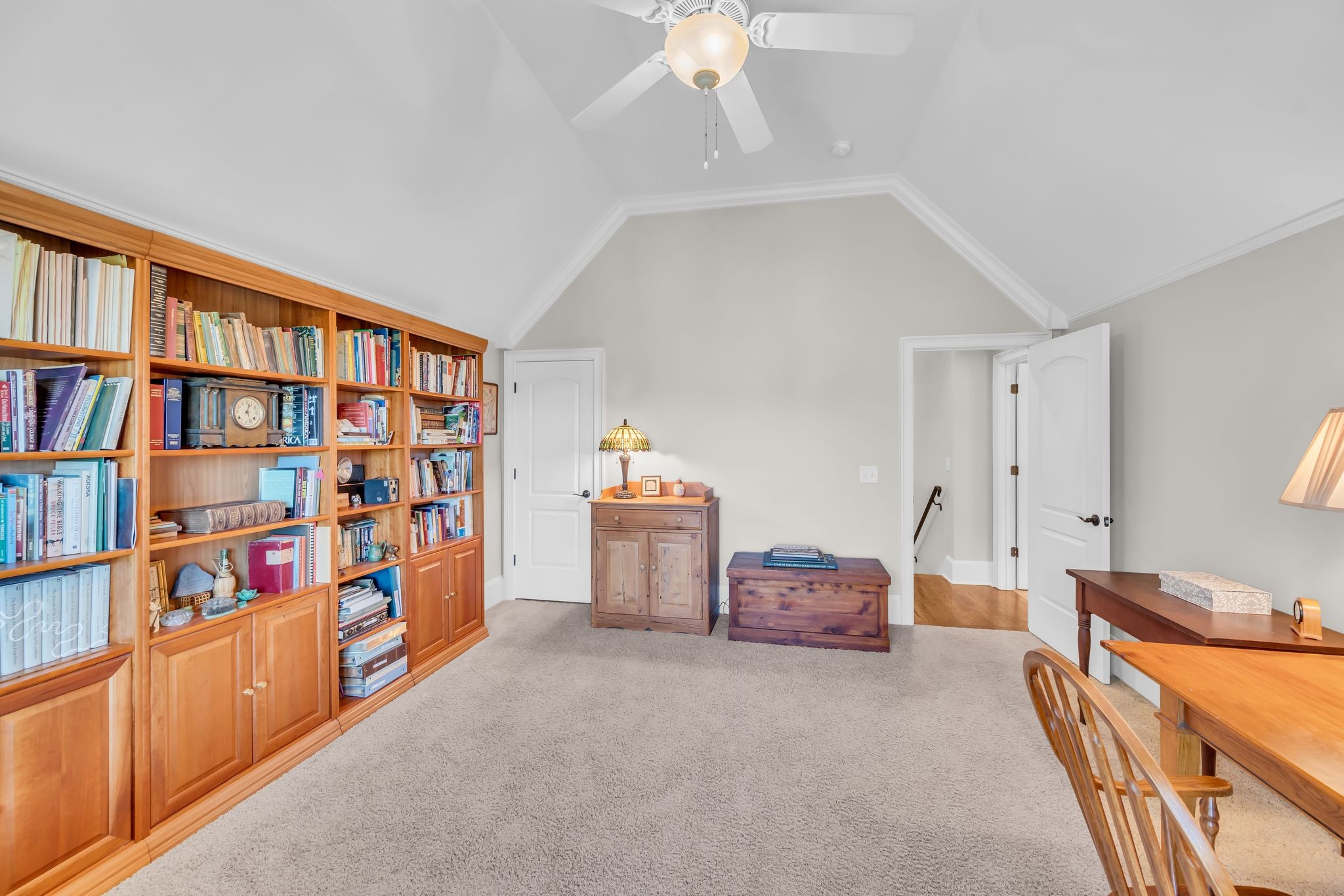 2449 Durham Manor Drive Franklin, TN 37064 - Photo 51 of 88 a bedroom with furniture and a book shelf