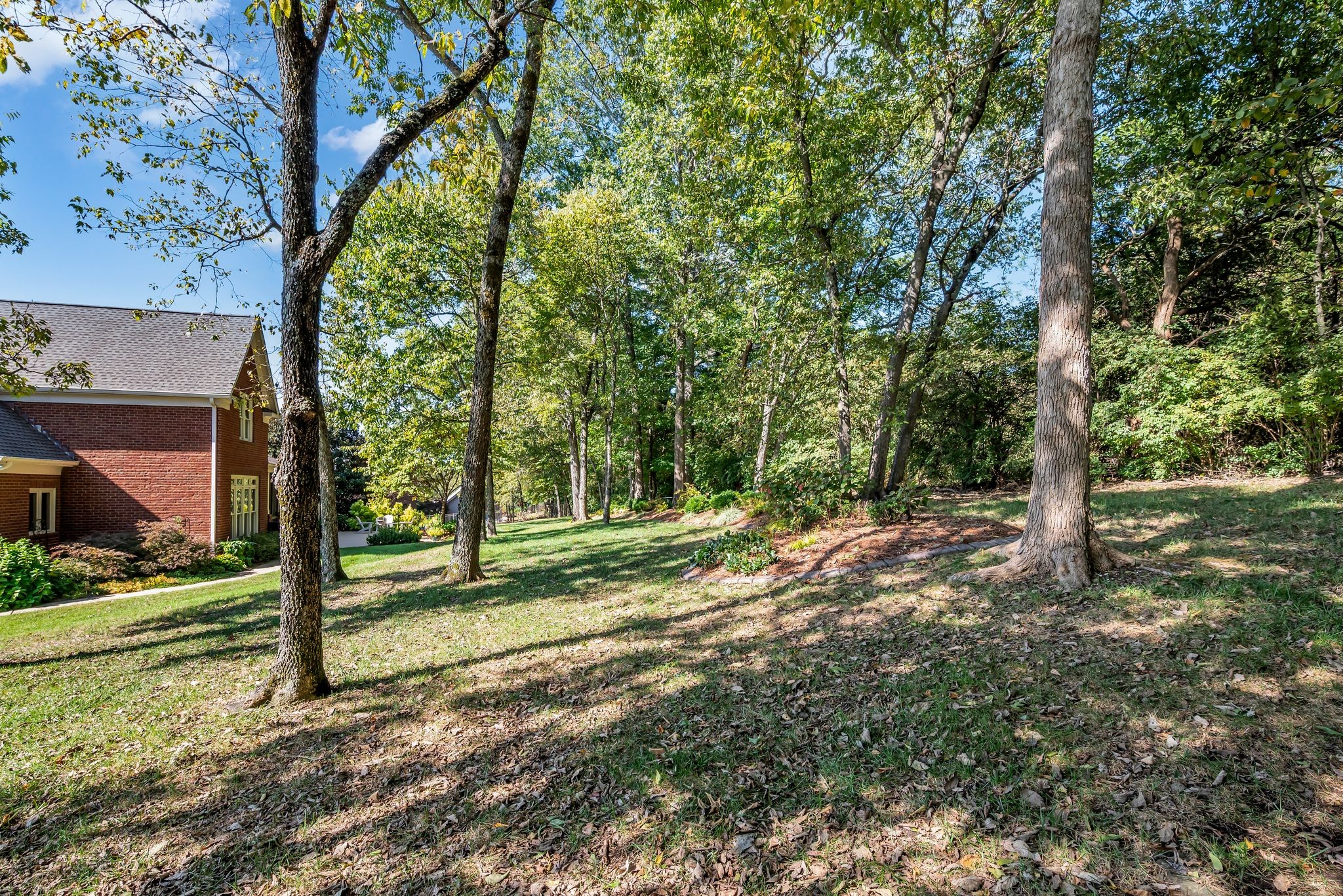 2449 Durham Manor Drive Franklin, TN 37064 - Photo 74 of 88 a view of a yard with plants and trees