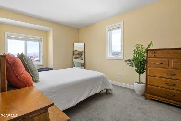 a bathroom with a sink vanity and a mirror