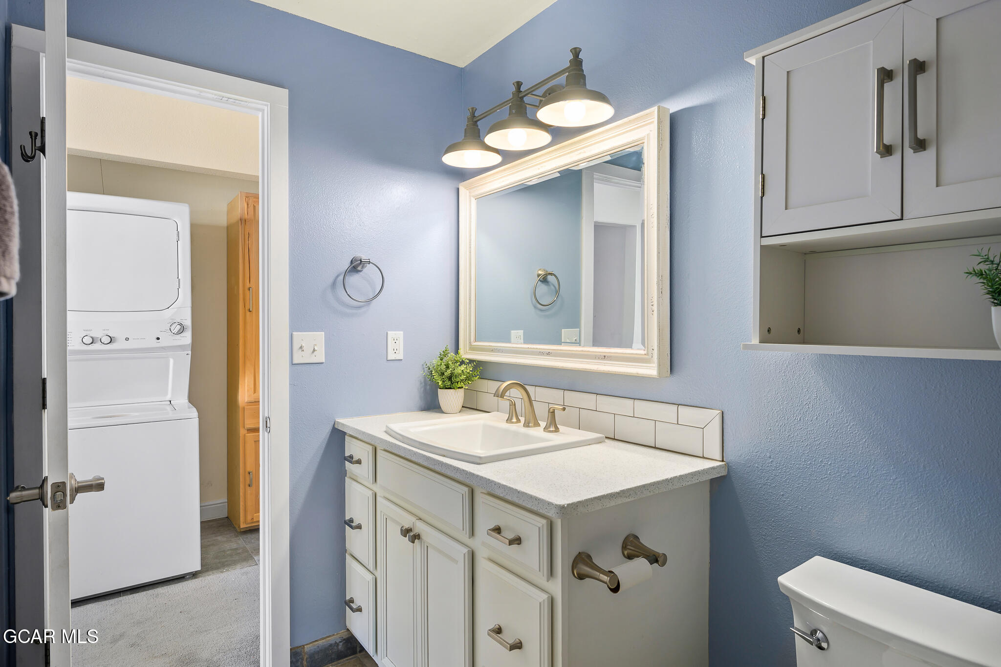 110 Carriage Road, Unit 8 Fraser, CO 80442 - Photo 20 of 36 a bathroom with a sink vanity and a mirror