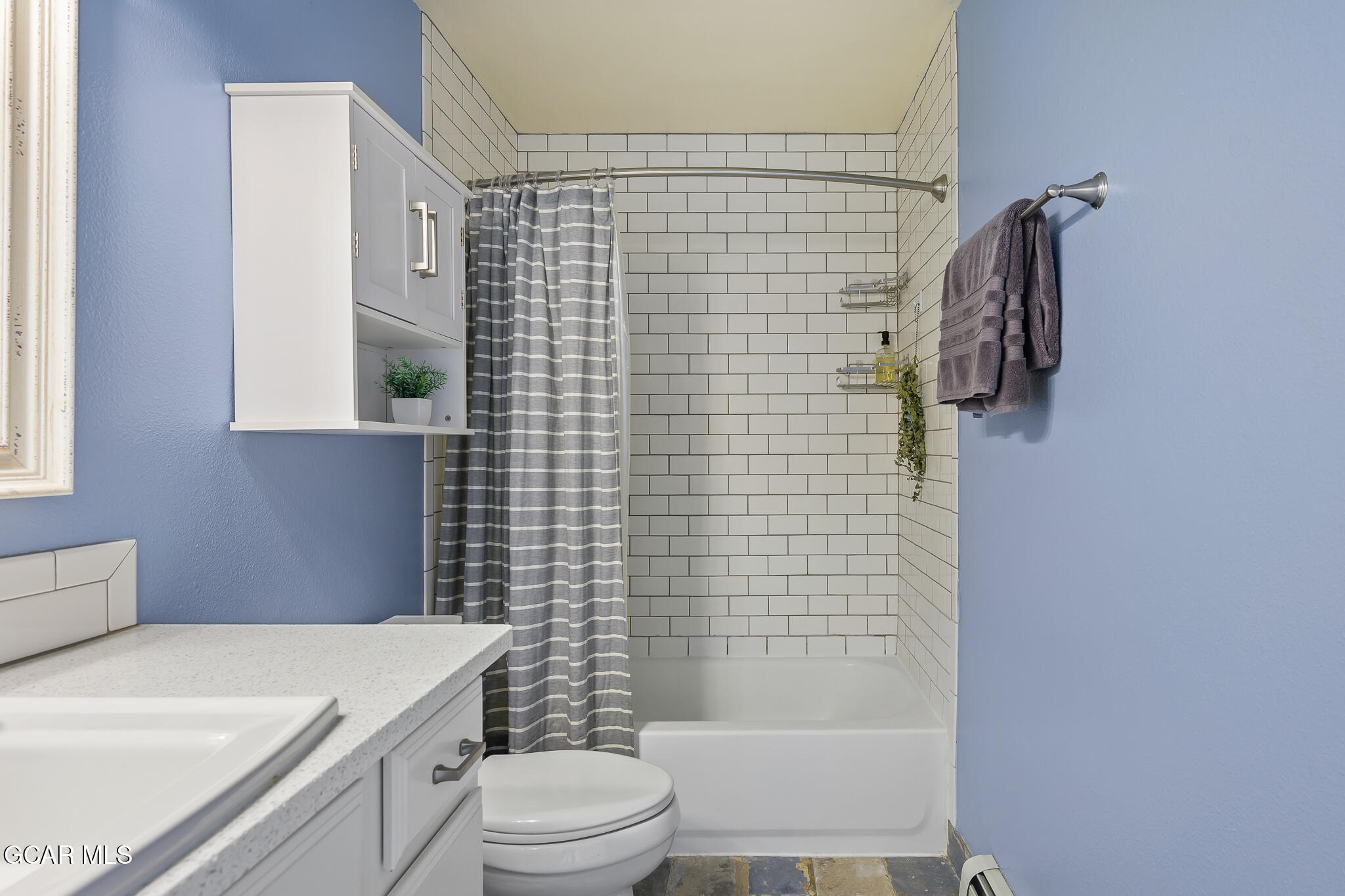 110 Carriage Road, Unit 8 Fraser, CO 80442 - Photo 21 of 36 a bathroom with a sink a toilet and shower