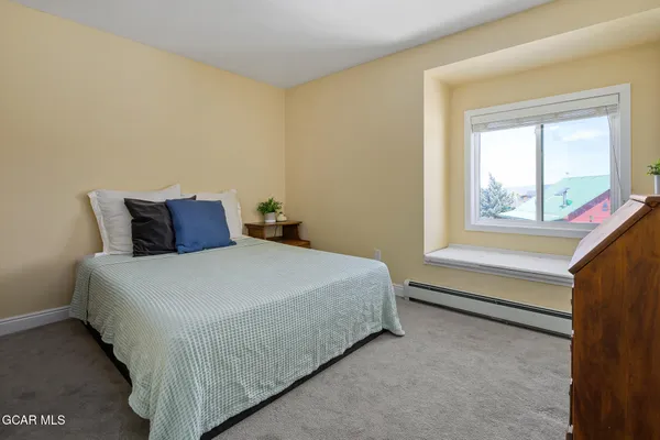 front view of a house with a deck