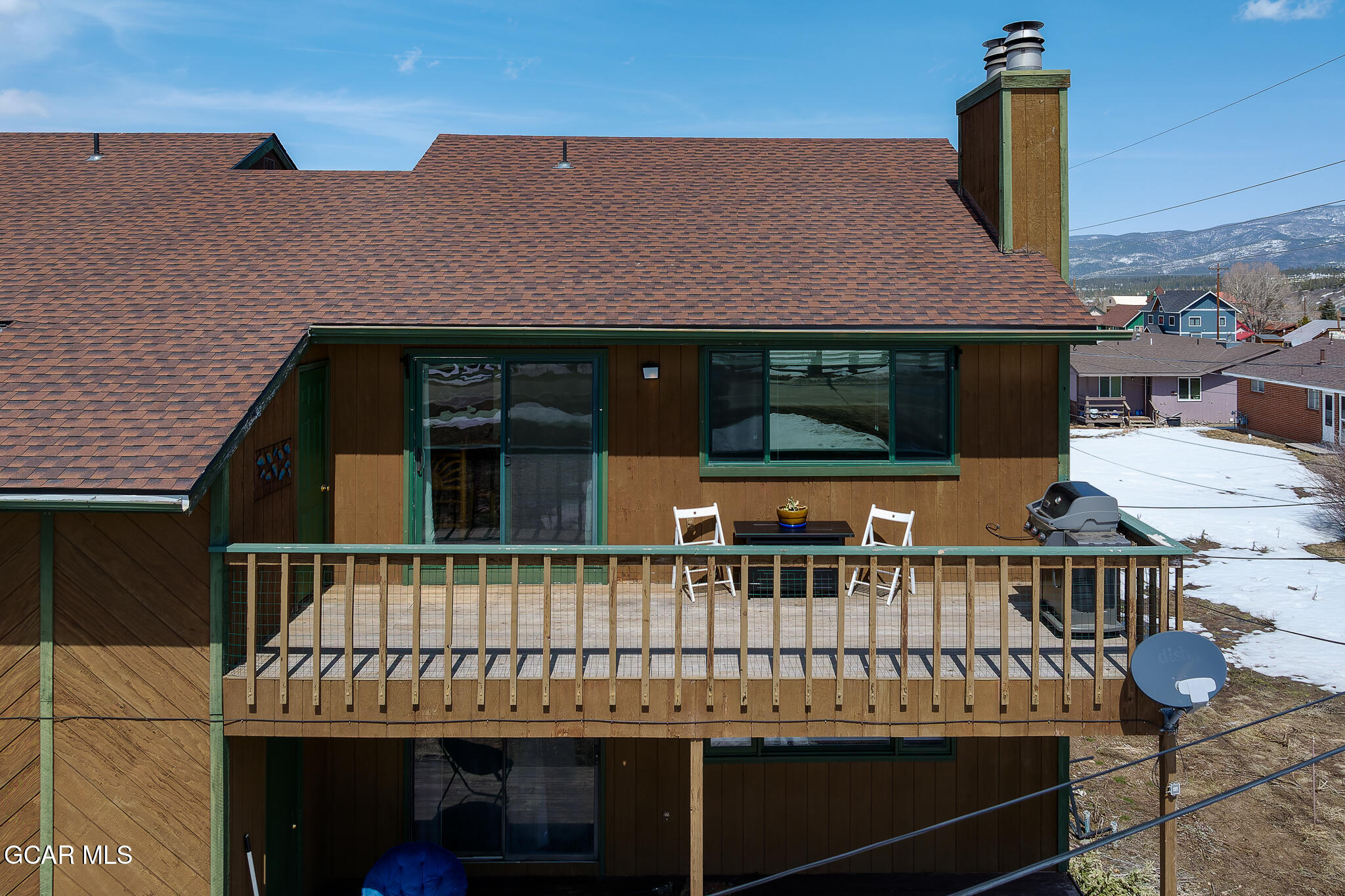 110 Carriage Road, Unit 8 Fraser, CO 80442 - Photo 26 of 36 front view of a house with a deck