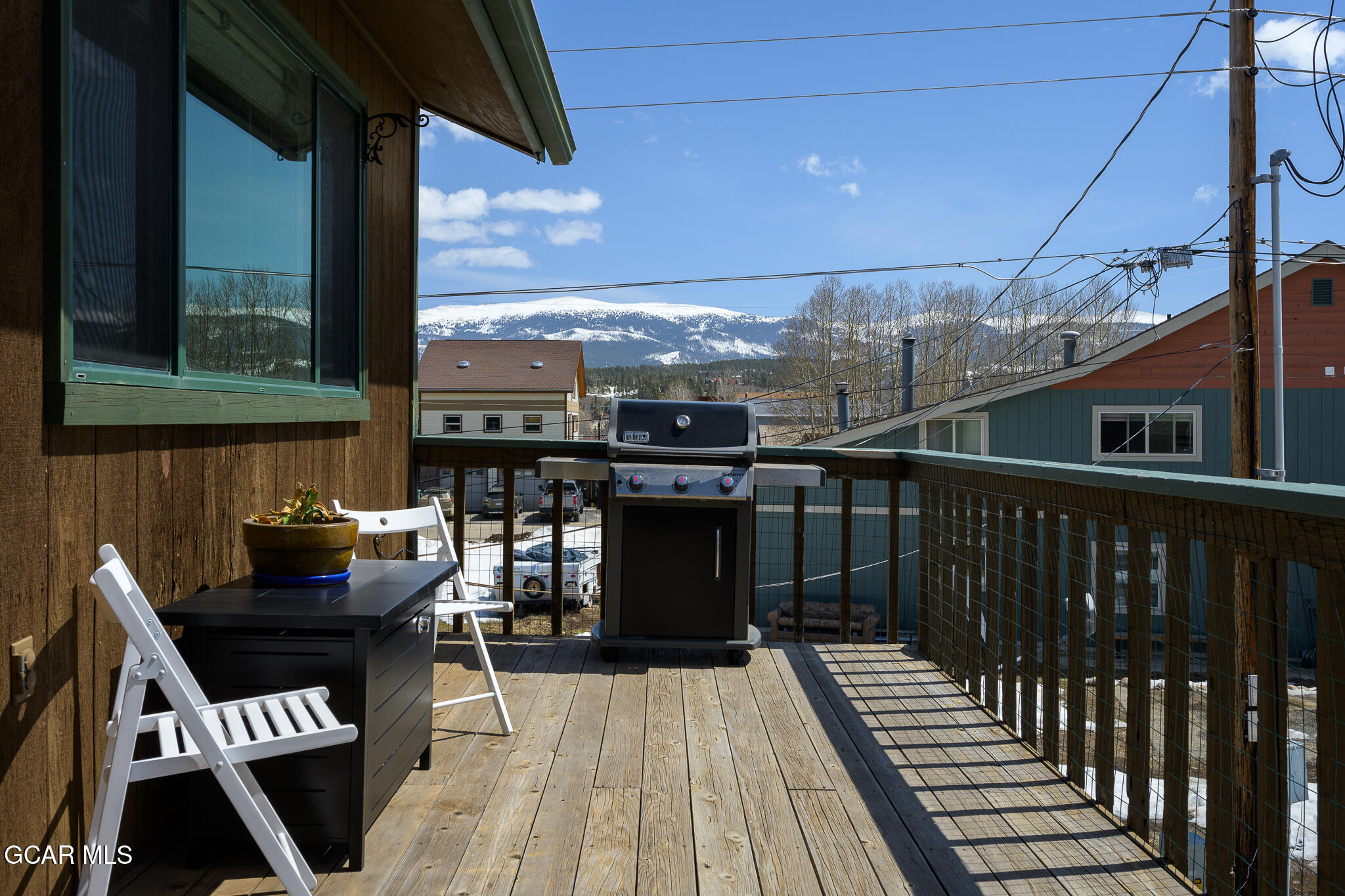 110 Carriage Road, Unit 8 Fraser, CO 80442 - Photo 27 of 36 a view of a balcony with wooden floor