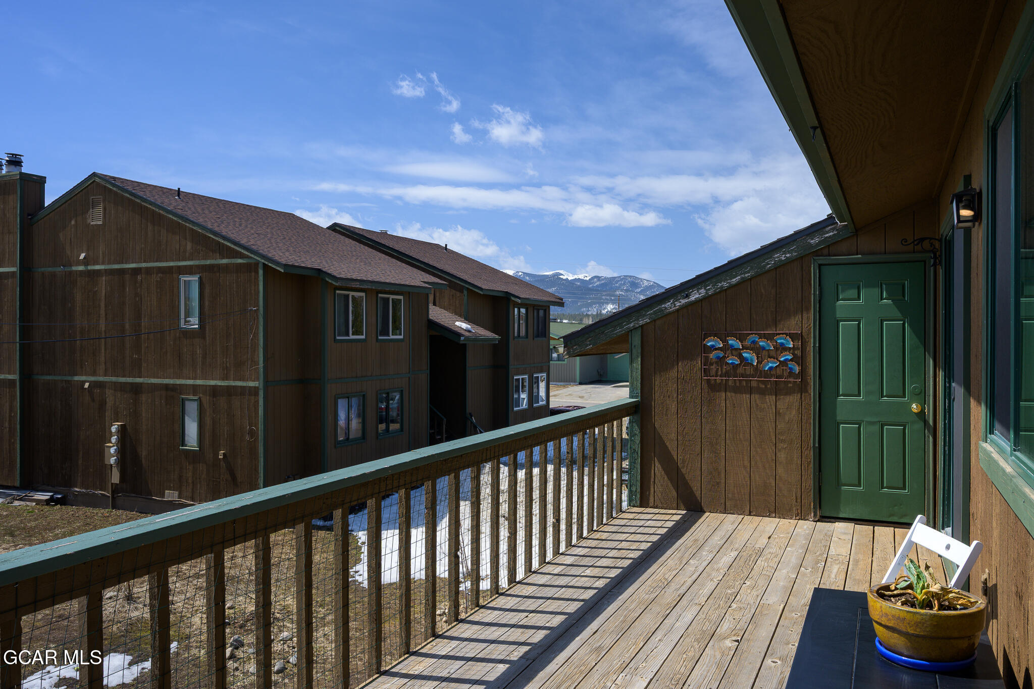 110 Carriage Road, Unit 8 Fraser, CO 80442 - Photo 29 of 36 a view of a chairs and tables in the balcony