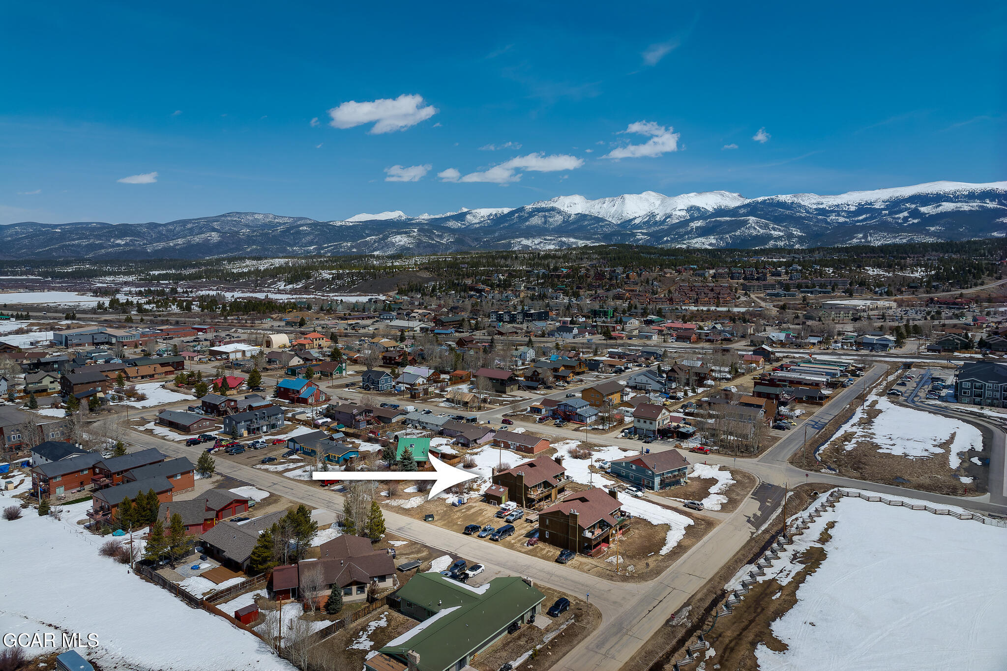 110 Carriage Road, Unit 8 Fraser, CO 80442 - Photo 36 of 36 an aerial view of residential houses with outdoor space