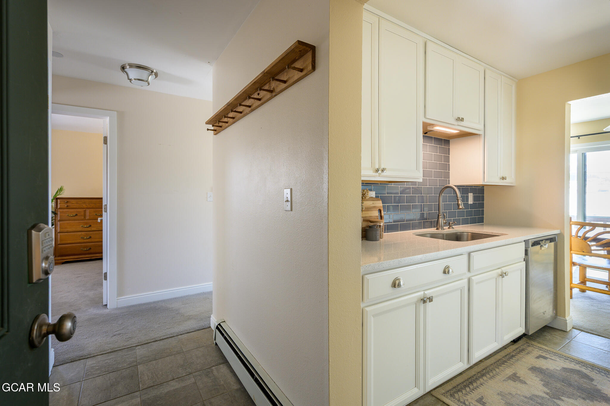 110 Carriage Road, Unit 8 Fraser, CO 80442 - Photo 5 of 36 a bathroom with a sink and a mirror