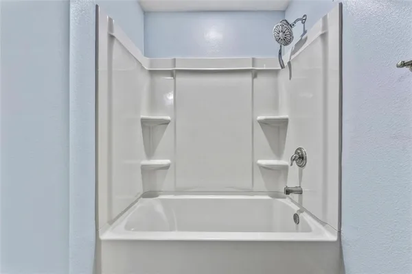 a bathroom with a bathtub