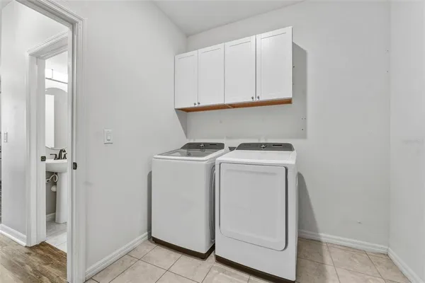 a utility room with dryer and washer