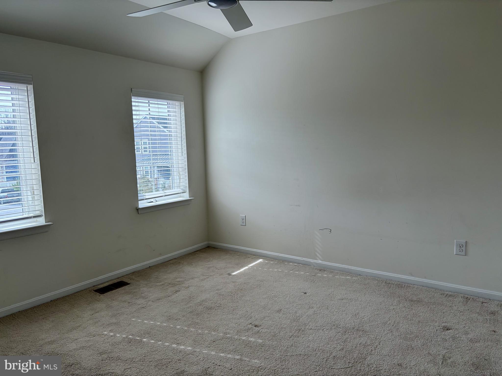 301 Arch Street Milton, DE 19968 - Photo 11 of 34 an empty room with windows