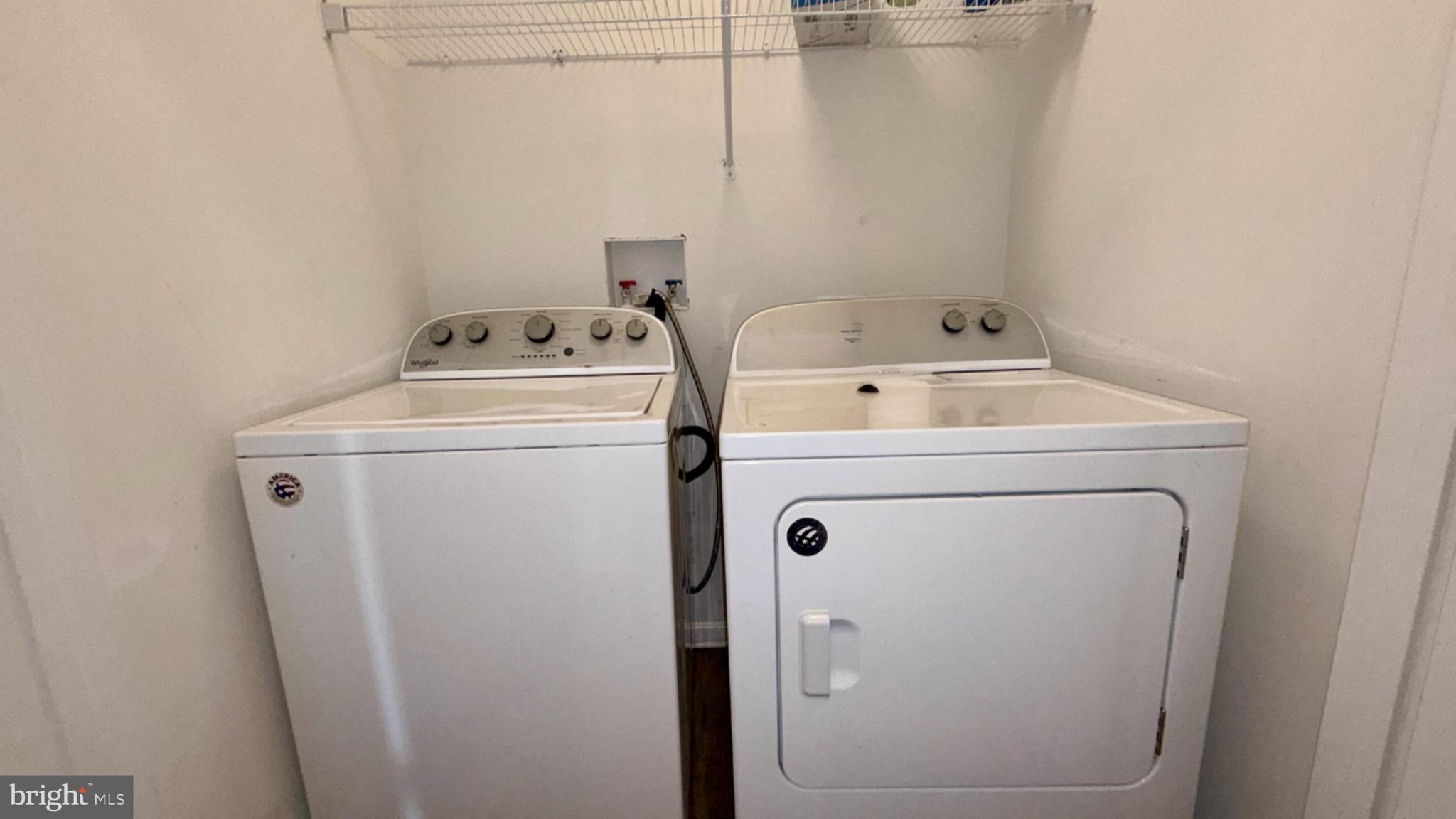 301 Arch Street Milton, DE 19968 - Photo 17 of 34 a utility room with dryer and washer