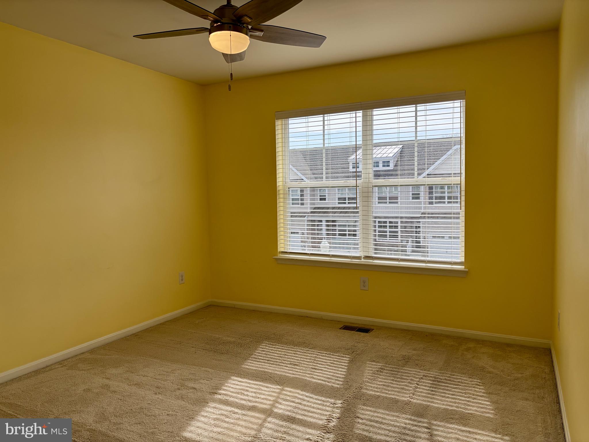 301 Arch Street Milton, DE 19968 - Photo 22 of 34 a view of an empty room with a window