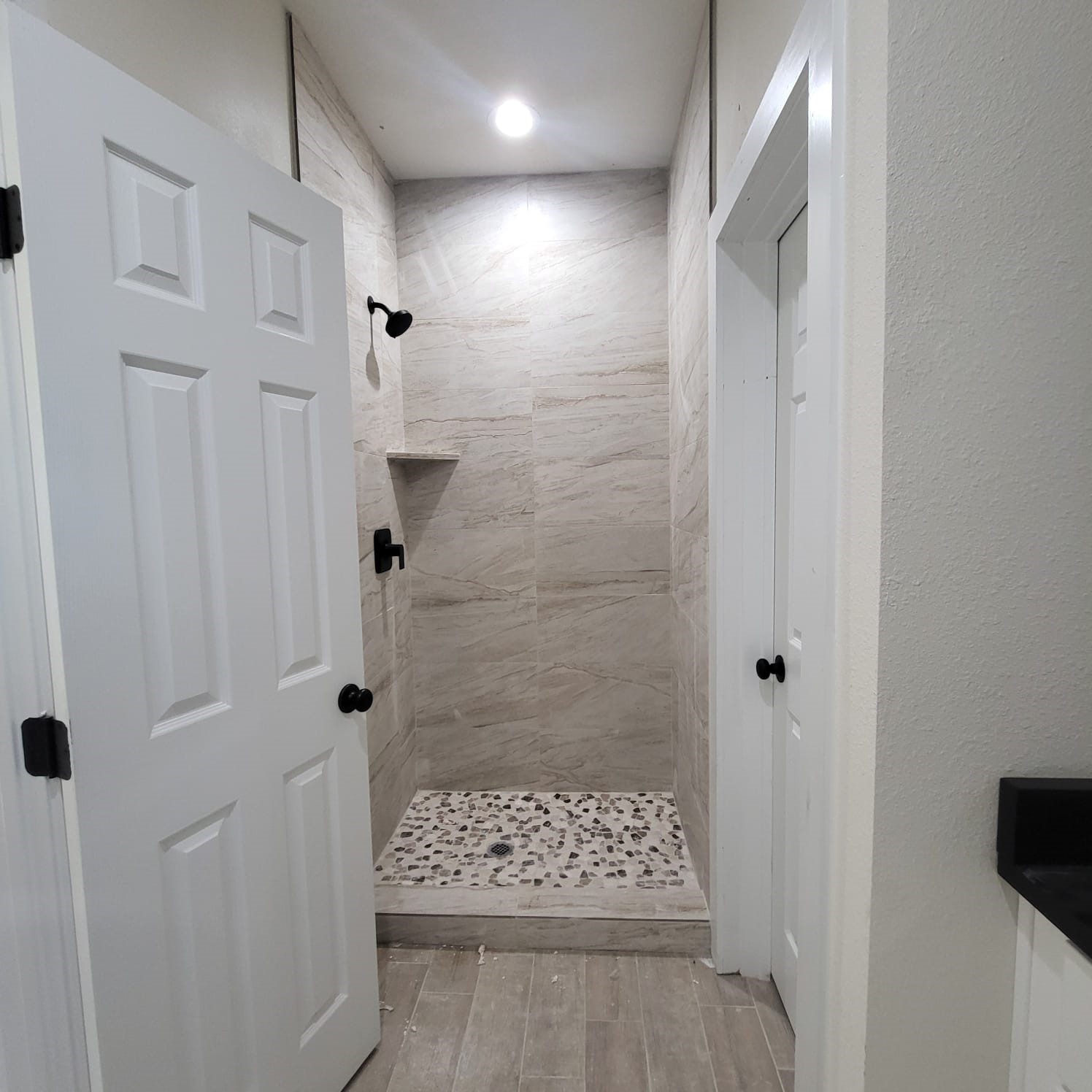 5608 Tommye Street, Unit B Houston, TX 77028 - Photo 4 of 10 a bathroom with a shower and a sink