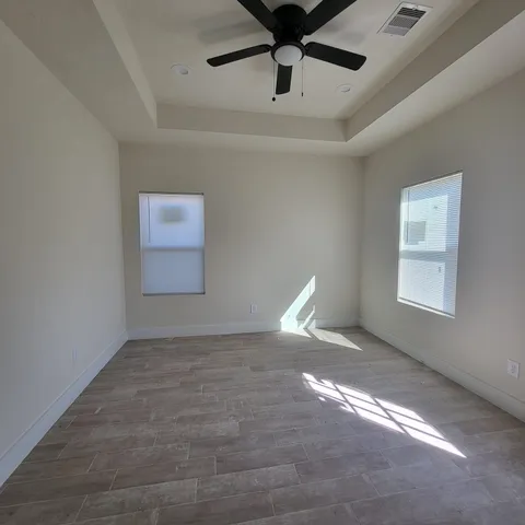 an empty room with windows