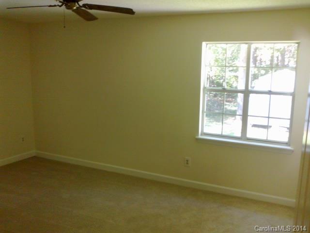 21141 Pine Ridge Drive Cornelius, NC 28031 - Photo 11 of 15 an empty room with a window