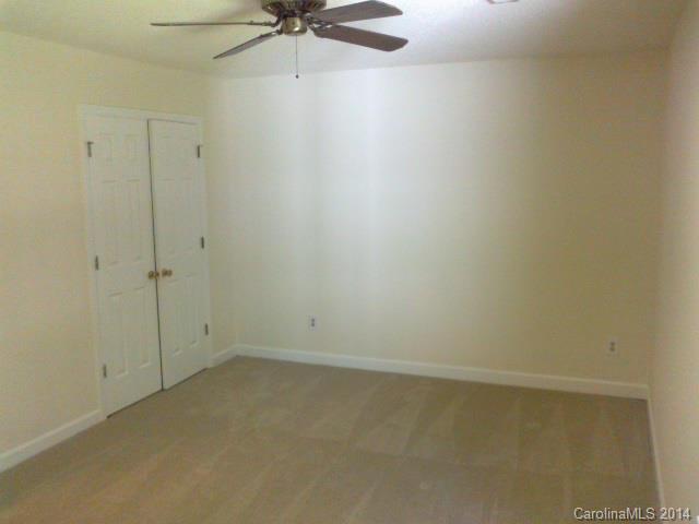 21141 Pine Ridge Drive Cornelius, NC 28031 - Photo 13 of 15 a view of an empty room