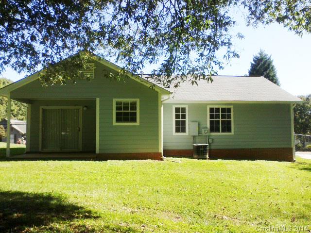21141 Pine Ridge Drive Cornelius, NC 28031 - Photo 15 of 15 a front view of a house with a yard