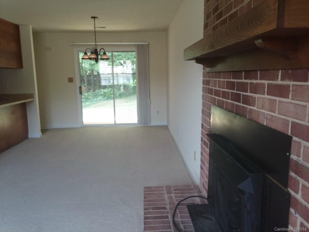 21141 Pine Ridge Drive Cornelius, NC 28031 - Photo 6 of 15 a view of an empty room with a window