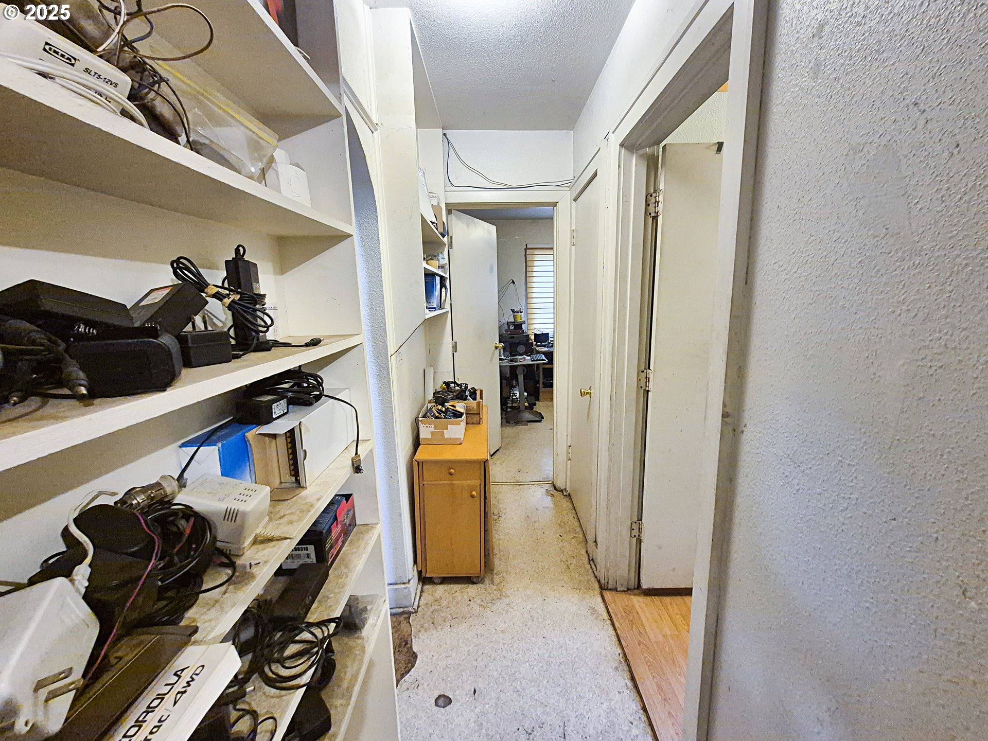 617 G Street Springfield, OR 97477 - Photo 15 of 26 a view of walk in closet with clothes and shoes