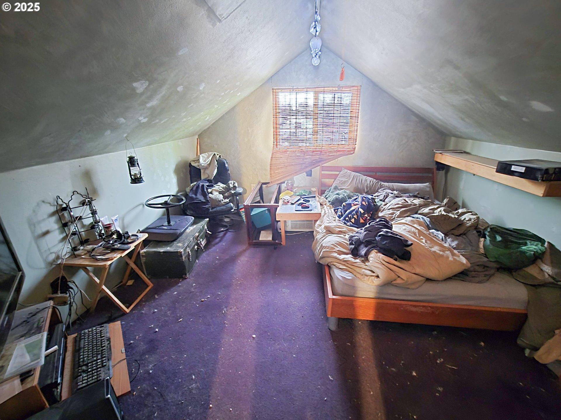 617 G Street Springfield, OR 97477 - Photo 20 of 26 a living room with furniture and a chandelier
